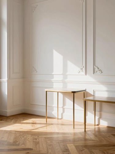 Sunlit Parisian apartment interior, chevron wooden parquet flooring, high white walls with classic plaster moldings, elegant minimalist furniture, soft afternoon light, 35mm lens.