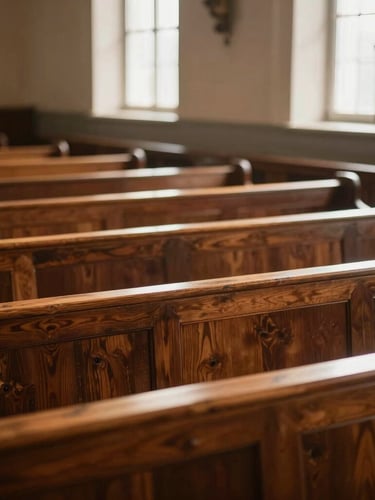 A warm empty church sanctuary with natural morning light hitting the wooden pews, shallow depth of field, rich deep tones with parchment undertones.