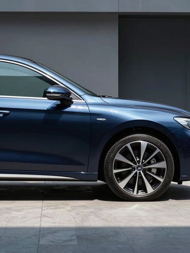 Sharp profile shot of a modern dark blue sedan, high-contrast cool daylight, metallic reflections, 50mm lens, clean urban background