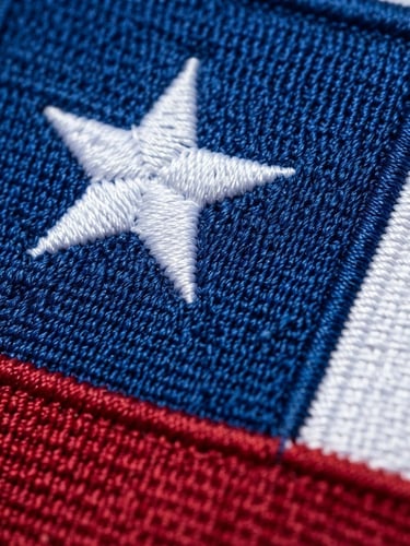 Close-up of a premium embroidered national flag of Chile, deep red and blue threads, high-density stitching, crisp daylight.