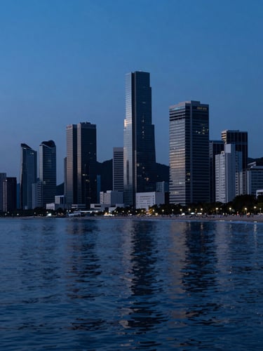 Extreme wide shot of Balneário Camboriú coastline at twilight, deep blue hour light reflecting on calm sea, sharp architectural silhouettes, negative space on the left