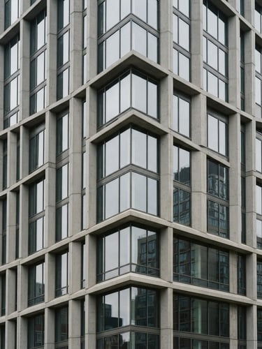 Architectural close-up of a modern corporate concrete and glass skyscraper facade, sharp clean lines, soft natural overcast daylight, professional 35mm photography