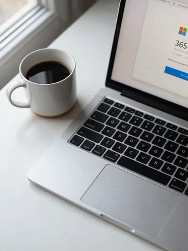 Close-up overhead flat-lay of a laptop keyboard and a coffee mug on a clean white desk, natural window light from the left, a Microsoft 365 sign-in screen visible on the screen, calm and functional