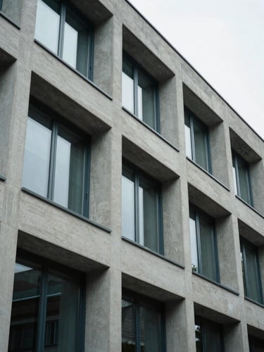 Close-up of a Swiss architectural facade in Zug, clean lines, concrete and dark glass, overcast morning light, soft shadows, editorial style