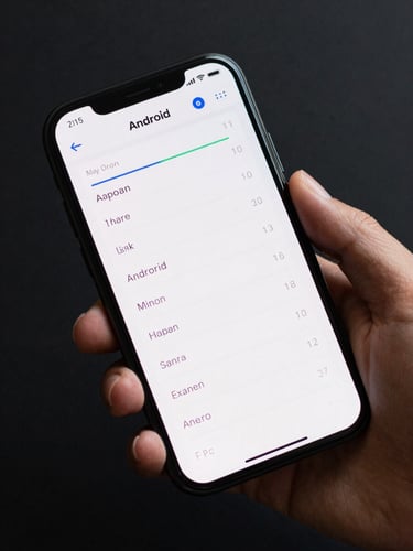 Close-up overhead shot of a hand holding an Android phone displaying a clean progress chart app UI, daylight-balanced studio light, metric numbers clearly visible on screen, phone at a natural slight tilt against a near-black surface