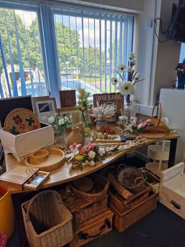 A table in our gift room displaying secondhand goods for sale