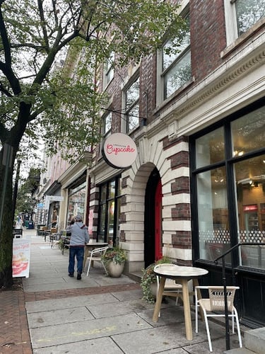 View of stores and Cupcake shop along sidewalks of downtown Lancaster, Pennsylvania