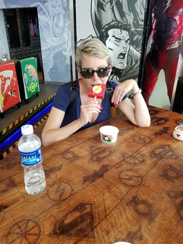 Lady Michelle enjoys a superhero ice cream at a Singapore mall.
