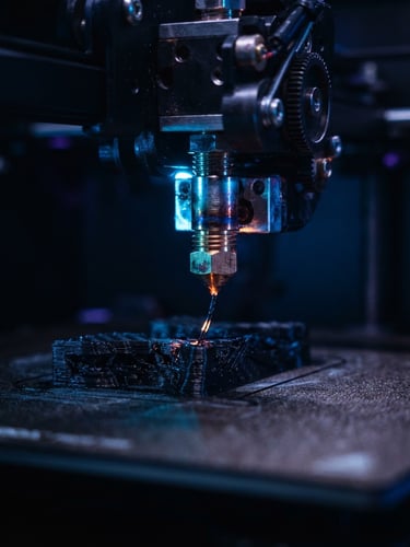 Macro close-up of a high-precision 3D printer nozzle extruding carbon fiber with sharp blue LED highlights, dark moody atmosphere, 85mm lens