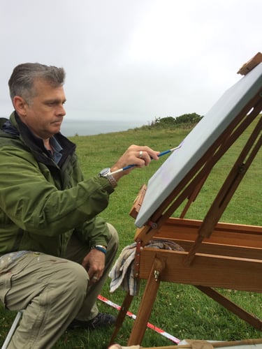 Chris Gill painting outdoors