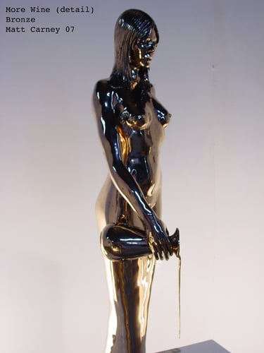 Shiny bronze sculpture of a woman pouring from a carafe side view