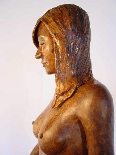 detail of wax model upper torso, hair and face