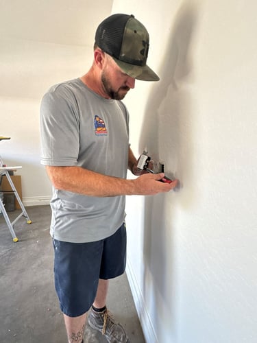 At Hand Heroes Fixing Electrical Outlet in Sun City, AZ