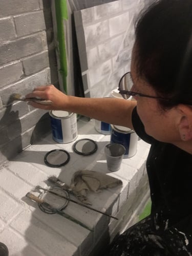 marcine painting a fireplace in monmouth county nj