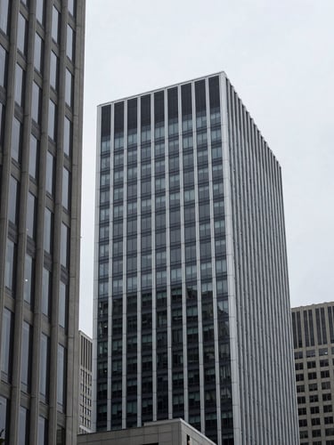 Crisp corporate photography, cool overcast daylight, architectural lines of a modern Ontario business district, sharp focus, professional lens, 35mm