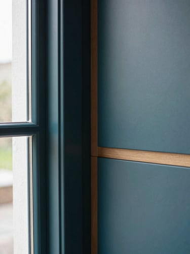 Portrait close-up of a perfectly aligned wood joint in a custom kitchen cabinet, natural window light, architectural interior photography