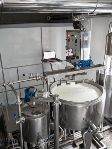 lactase dosing in milk processing at dairy factory 
