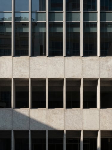 Minimalist modern Hong Kong architecture facade with sharp, directional morning light creating distinct linear shadows on concrete and glass, wide angle