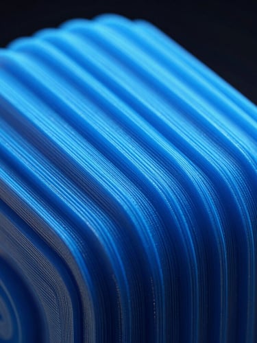 Extreme macro close-up of precise layer lines on a 3D printed object, showing filament-grade texture, dramatic neon blue edge-lighting, dark high-contrast background, ultra-detailed, octane render