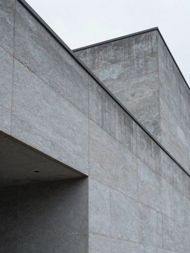 Macro shot of cold grey architectural stone, clean geometric lines of a modern court building in Luxembourg, soft overcast daylight.