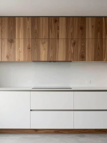 Minimalist kitchen installation with grain-matched walnut cabinetry and white lacquered panels, straight-on architectural elevation, natural diffused side-lighting.