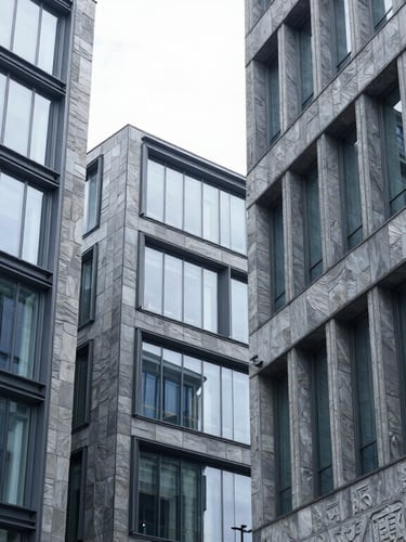 Architectural lines of a modern slate-gray corporate building interior, clean glass and steel grids, bright cool-toned daylight.