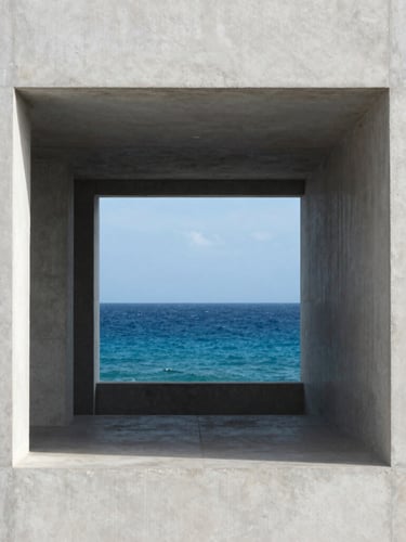 Architectural close-up of a minimalist corporate office facade in Cancún, clean concrete lines framing a deep blue ocean view, soft natural coastal light, 35mm editorial photography.