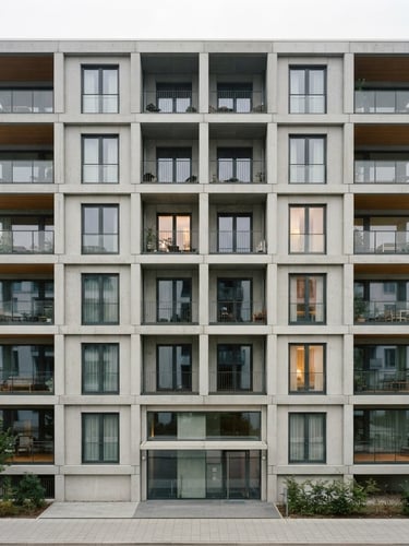 Orthographic architectural photograph of a modern German apartment building, clean concrete lines, sharp geometric structure, soft overcast daylight, desaturated neutral tones with warm amber accents