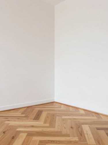 A clean interior room under bright natural daylight, showing sharp white drywall corners, newly laid oak parquet floor, dust-free professional finish, 35mm lens