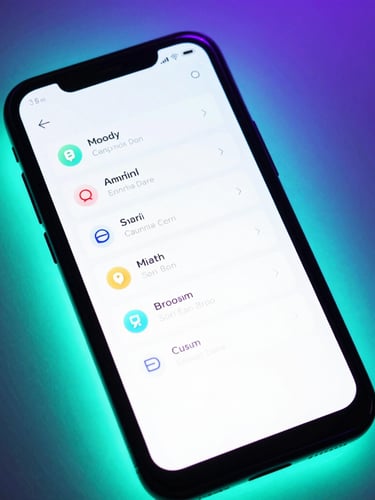 Moody tech photography of a high-contrast Android device mockup displaying a clean vector UI layout, illuminated by vibrant neon cyan backlighting, 35mm lens, close-up angled shot.