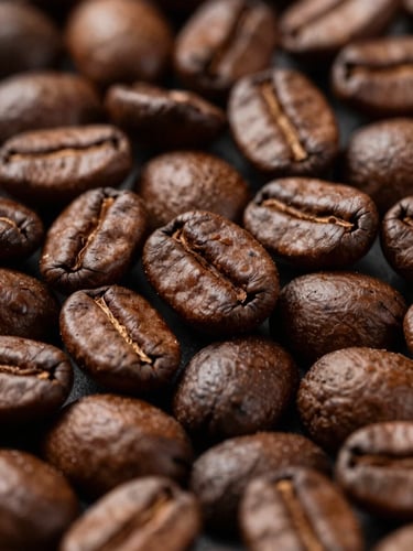 Close-up tight shot of raw arabica coffee beans filling the frame, rich dark brown tones, soft studio light from above, no people, no text
