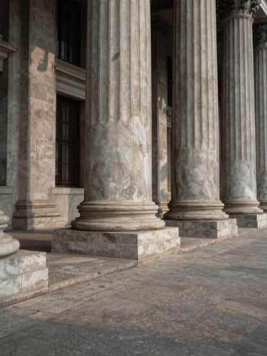 Wide-angle dramatic shadow cast across classical stone columns of a financial institution in Mumbai, low-contrast natural overcast daylight, tactile marble texture.