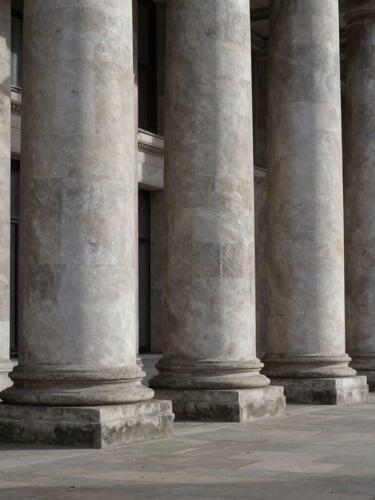 Wide-angle architectural view of brutalist stone columns in London, dramatic geometric shadows, natural overcast daylight, minimal and powerful.
