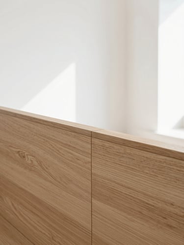 Bright architectural interior shot with natural daylight, showcasing a seamless joint on a premium light oak wood surface, clean lines, sharp focus, 35mm