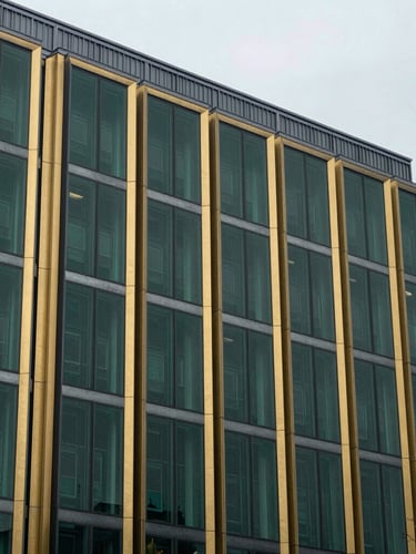 Macro architectural detail of the Rotterdam Beursplein building facade, overcast clean European daylight, professional corporate aesthetic, 35mm lens