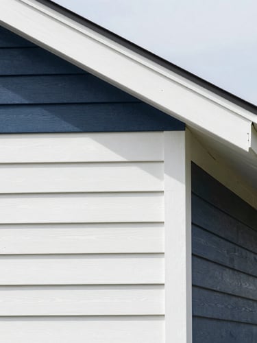 Crisp architectural photography of premium horizontal siding lines meeting a sharp roof edge, bright daylight, clean navy and white tones, 35mm lens.