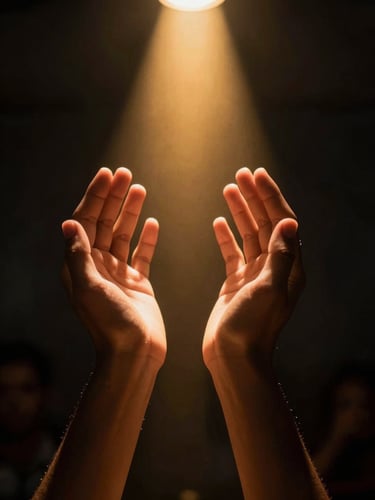 Dramatic close-up of hands raised in prayer, warm golden spotlight cutting through deep black background, high contrast, 35mm photography