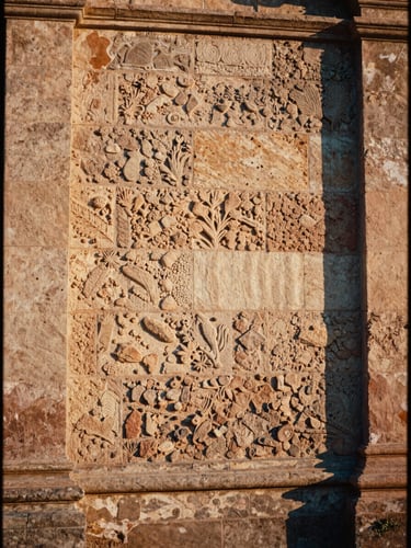 Elegant close-up of Oaxacan stone wall during golden hour, soft shadows, warm natural light, medium format film
