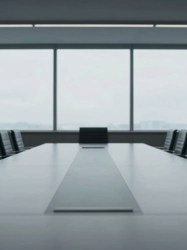 Symmetrical straight-on shot of an empty high-end conference room, cool overcast window light, clean horizontal lines, minimalist aesthetic.