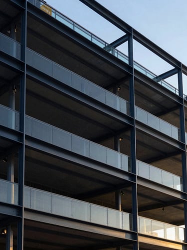 Sharp architectural photography of modern steel-and-glass structure in Phoenix, cool morning light, high-contrast shadows, clean structural lines, 35mm