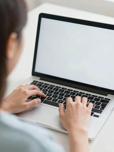 bright lifestyle photography, over-the-shoulder view of a woman working on a clean laptop screen, soft natural daylight, cool pastel tones, shallow depth of field