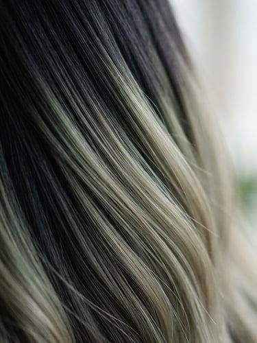 Close-up of clean hair texture with soft-focus color transition, elegant editorial photography, soft natural window light, shallow depth of field