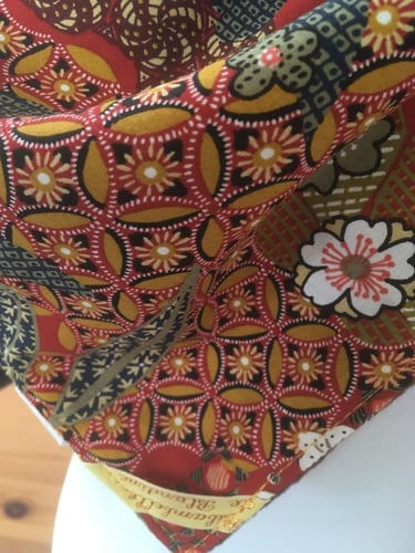 Comment fermer le col cache cou