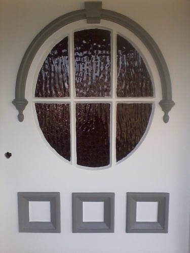 Exterior front door prepared for repainting by PJCPainters