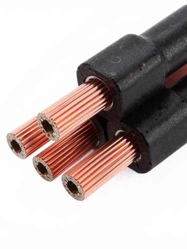 Crisp industrial product photography of multi-core control cables and VFD cables showing copper shielding, technical cross-section details, high contrast black and orange tones, sharp macro details, 50mm lens