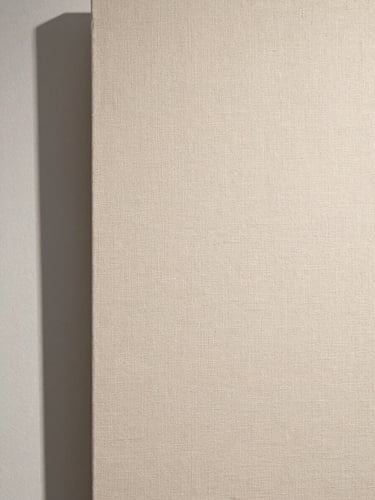Close-up elevation of a raw linen canvas texture, flat gallery lighting, architectural shadow line on the left, neutral off-white tones.