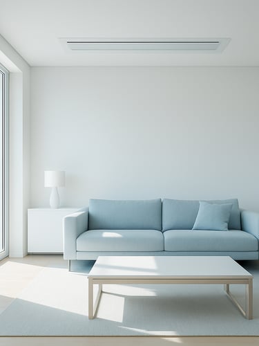Bright architectural interior of a minimalist living room, clean white walls, natural morning light, a sleek integrated air conditioning unit flush with the ceiling, professional 35mm lens
