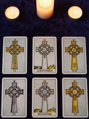 Top-down flat lay of a Celtic Cross tarot card spread on dark purple velvet, soft candlelight casting warm gold highlights, mystical editorial photography