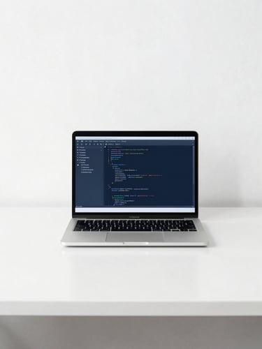 Minimalist workspace with a laptop showing clean code, bright neutral studio lighting, sharp focus, 35mm