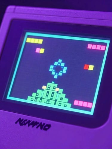 Close-up of a vintage hand-held gaming console screen glowing with pixel art in a dark room, neon purple ambient light, 35mm lens.